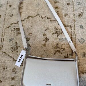 DKNY Off White NWT Pebbled AKIA Shoulder Bag Magnetized Closure on Top and Back.